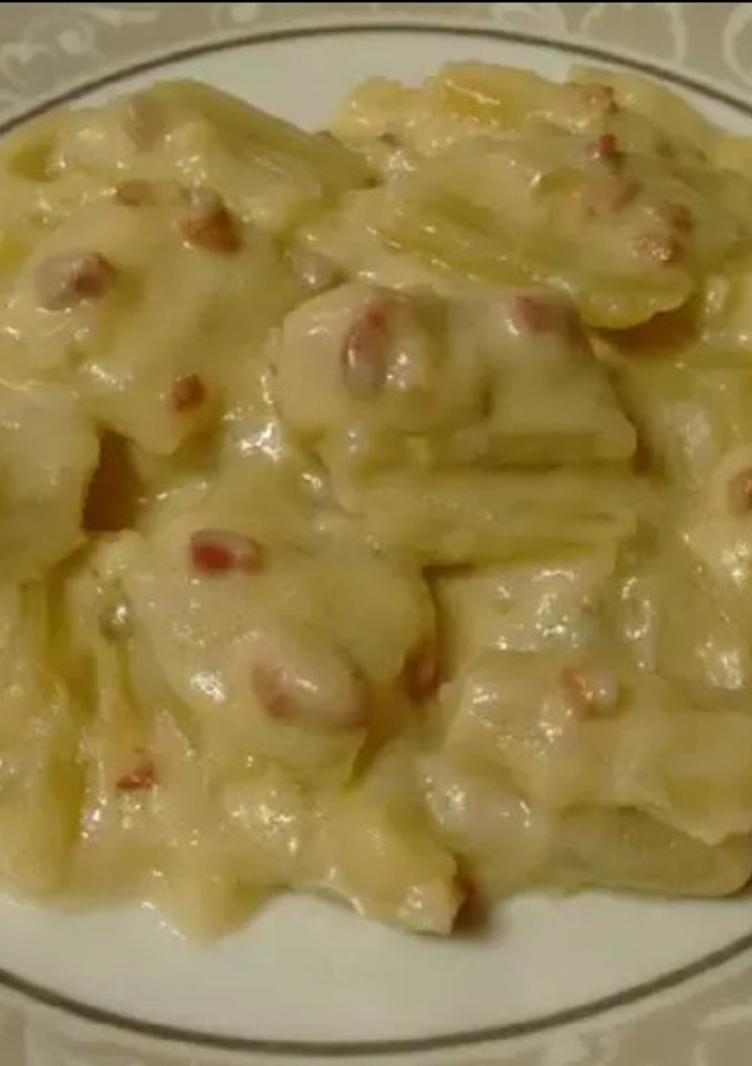 Una foto de Cardos con bechamel y jamón serrano