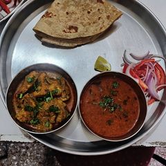 Sukha Chicken and chicken curry(tambda rassa, Maharashtra lunch) A picture of Sukha Chicken and chicken curry(tambda rassa, Maharashtra lunch).