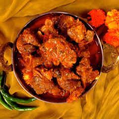 A picture of Kerala Style Mutton Curry.