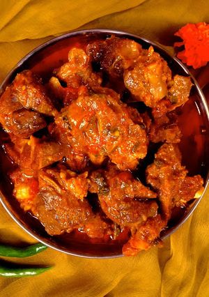 A picture of Kerala Style Mutton Curry.