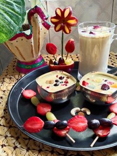 थंडाई फ्रुट कस्टर्ड (thandai fruit custard recipe in marathi) रेसिपी चे मुख्य फोटो