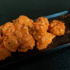 A picture of Steam momo in gravy.