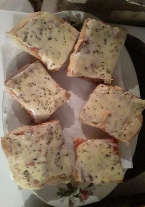 Una foto de Pizza con muzzarela