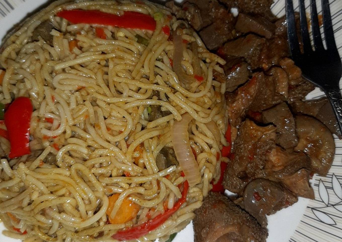 Stir fry pasta with offal pepper soup
