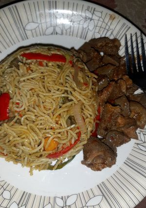 A picture of Stir fry pasta with offal pepper soup.
