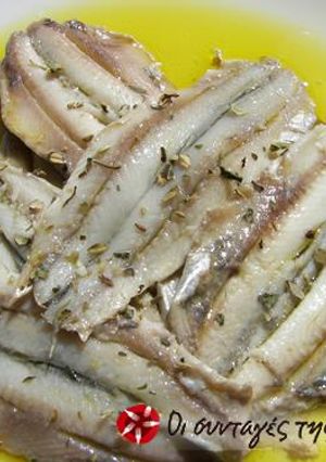A picture of Gavros (anchovies) in vinegar.