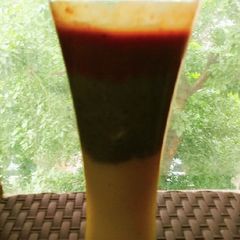 Tri-colour smoothie made from pineapple, kiwi and Cheri A picture of Tri-colour smoothie made from pineapple, kiwi and Cheri.