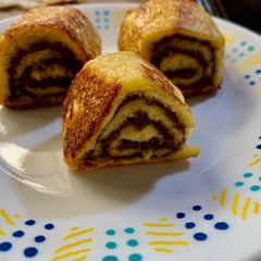 A picture of Nutella French toast roll up.