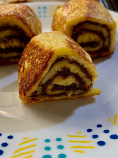 A picture of Nutella French toast roll up.