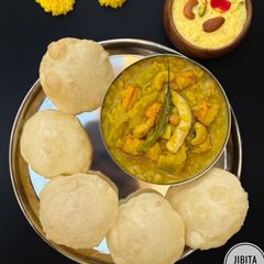 A picture of Lau, Paneer diye Chola’r Dal (Chana Dal with Louki/ Bottle Gourd and Paneer/Cottage Cheese).