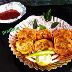 A picture of Tomato pakode(Streetfood).