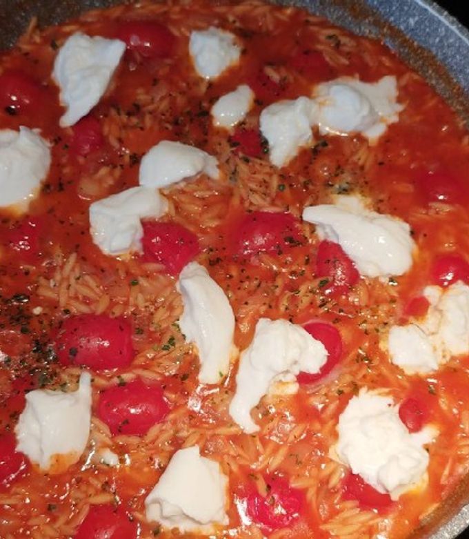 Une photo de Poêlée avoine tomate 🍅 et mozza