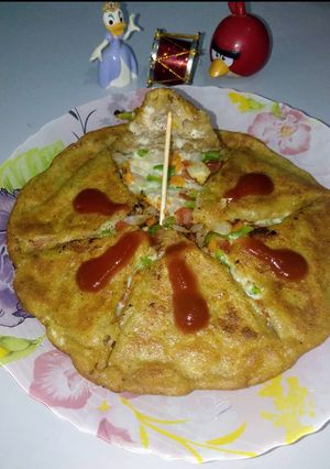 A picture of Moong daal veggie stuffed cheela.