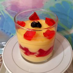 A picture of Vanilla custard with strawberry jelly 🍓🍓.