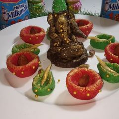 A picture of Kaju coconut Diyas.