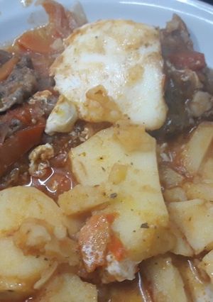Una foto de Bifes a la Criolla