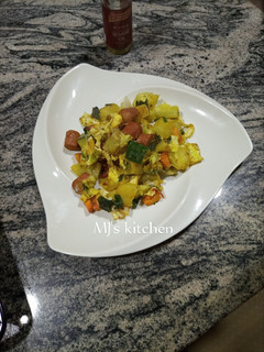 A picture of Baked sweet potatoes in vegetable mix.