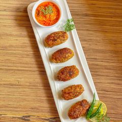 A picture of Lauki ke Kabab Tomato Masale ke saath.