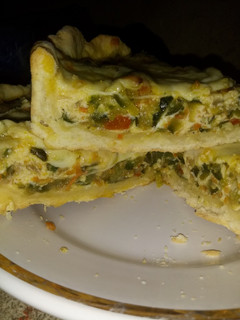 Una foto de Tarta de zapallitos con masa casera