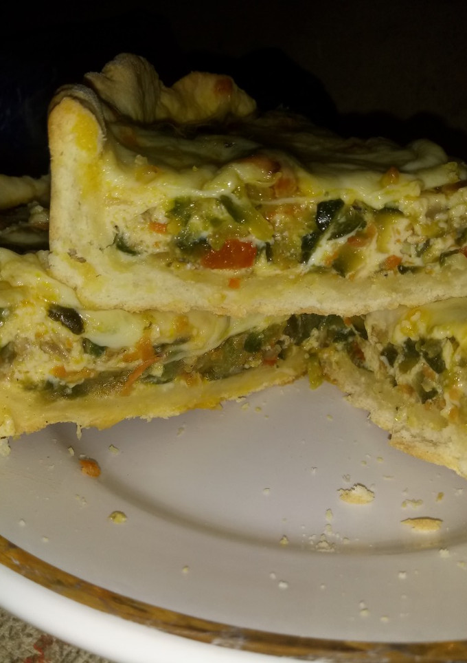 Una foto de Tarta de zapallitos con masa casera