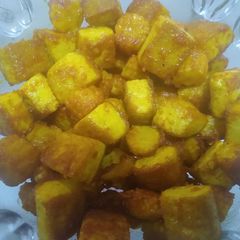 A picture of Crispy tofu and baby corn.