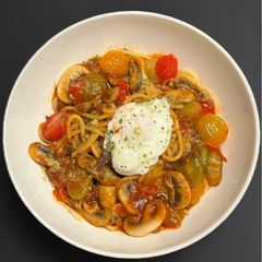A picture of Mushroom & Cherry Tomato Pasta with Poached Egg.