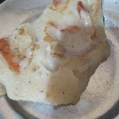 A picture of Suji uttapam.