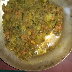 A picture of Cingri thor ghonto (banana stem prawn curry).