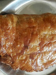 Una foto de Hojaldre de gambas y champiñones