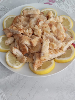 Una foto de Tiras de pollo al limón