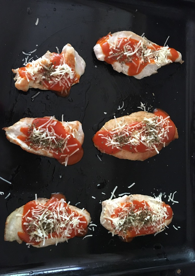 Una foto de Filetes de pollo “pizza”