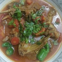 A picture of Gajar Gosht / Carrots with meat.
