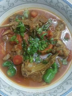 A picture of Gajar Gosht / Carrots with meat.