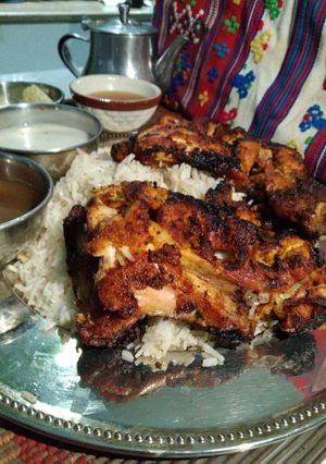 A picture of Chicken Tikka With Tarka Rice.
