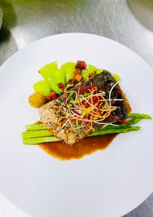 Hình của món Cá chẽm sốt bơ cà.