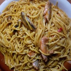 A picture of Jollof spaghetti with geisha.