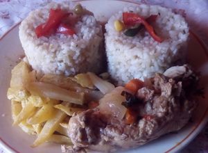 Una foto de Arroz con pollo al jugo