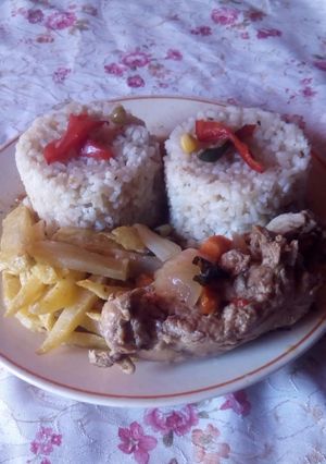 Una foto de Arroz con pollo al jugo