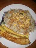 Arroz frito con culantro y pollo