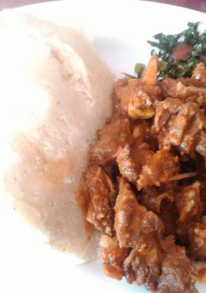 A picture of Ugali with fried beef and skuma.