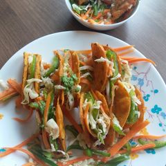 A picture of Backed veg tacos.