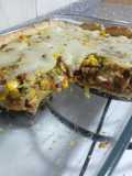 Tarta de masa casera rellena de carne molida, zapallitos, choclo