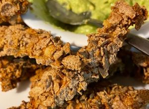 Una foto de Fingers de pollo crujientes y sanos en airfryer
