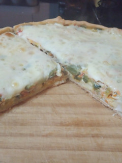 Una foto de Súper tarta de zapallitos y pollo 🍗