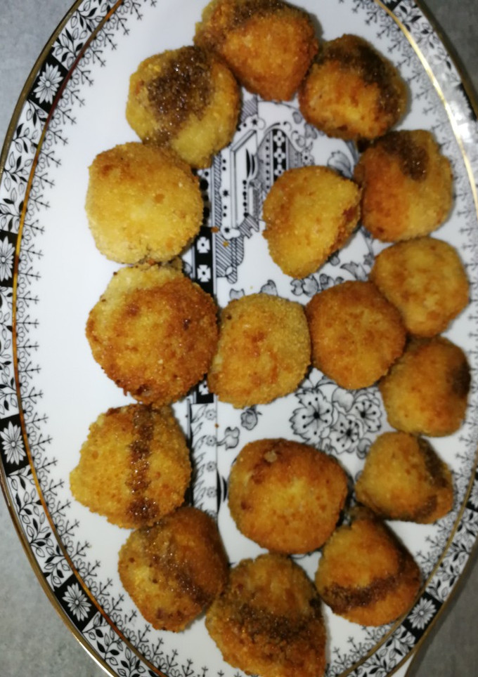 Una foto de Croquetas Oliver con crema balsámica
