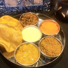 Halwa poori thalliPart 3(cholay ki tarkari) A picture of Halwa poori thalliPart 3(cholay ki tarkari).