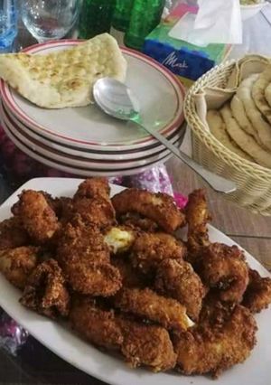 A picture of Fried Fish🐟 Fillet with Naan.