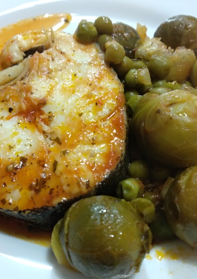 Una foto de Bacalao con coles de Bruselas
