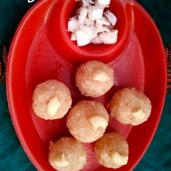 A picture of Coconut semolina laddu.