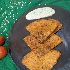 A picture of Tomato Neer Dosa.
